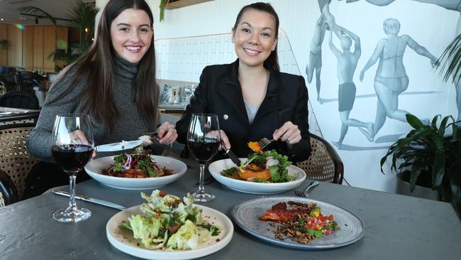 Bianca Cannell, 21 of Paddington and Kristy Graham, 25 of Kedron, eating at Three Blue Ducks. One in two dinners thinks about sustainability and where their food is sourced. Picture: Liam Kidston.