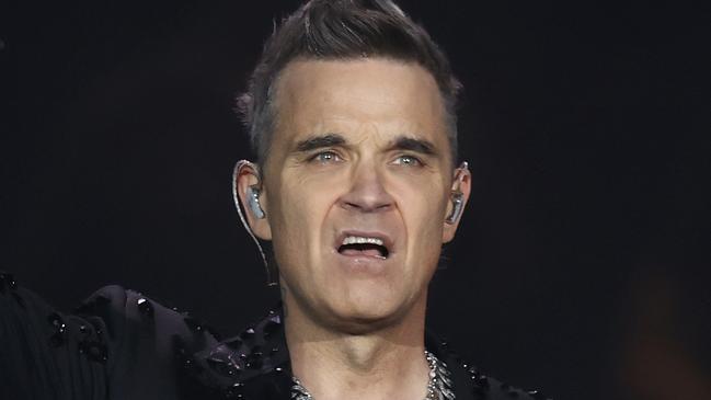 DAILY TELEGRAPH NOVEMBER 16, 2023. Robbie Williams on stage during his concert at Allianz Stadium in Sydney. Picture: Jonathan Ng
