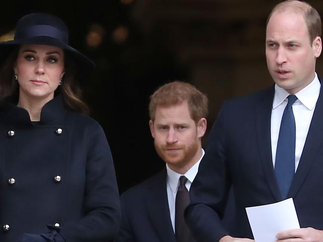 Britain's Catherine, Duchess of Cambridge, Britain's Prince William, Duke of Cambridge and Britain's Prince Harry leave after attending the Grenfell Tower National Memorial Service at St Paul's Cathedral in London on December 14, 2017, to mark the six month anniversary of the Grenfell Tower fire.  Britain marked on December 14, 2017, the six-month anniversary of London's Grenfell Tower fire that killed 71 people, with most survivors still awaiting permanent housing and sagging confidence in a public probe into the tragedy. / AFP PHOTO / POOL AND AFP PHOTO / Daniel LEAL-OLIVAS