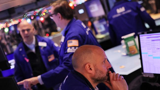 Traders at the New York Stock Exchange where giants such as Amazon and Apple are in heavy demand. Picture: Getty Images