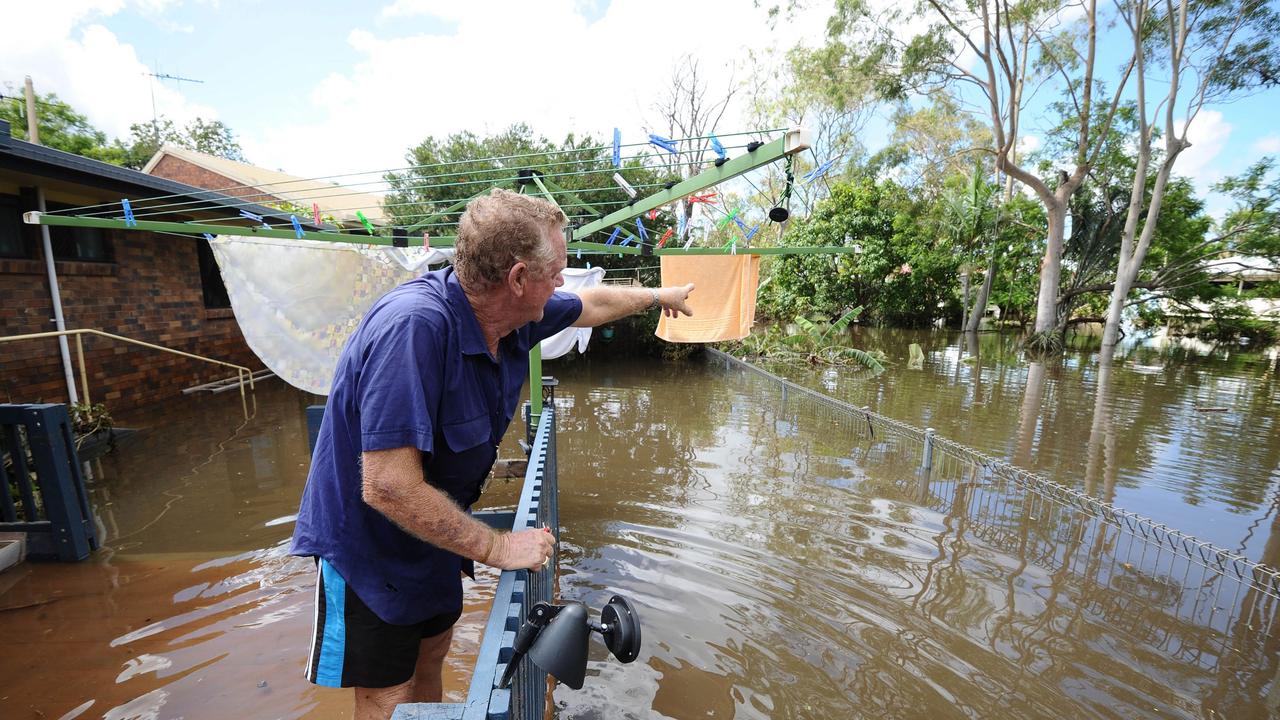 News Courier Mail, 30.1.2013, Bundaberg Flood, Robert Holtzberger, retired comes home to change his shirt &amp; get into his flooded house in Glenforest for the first time. Photo Paul Beutel.