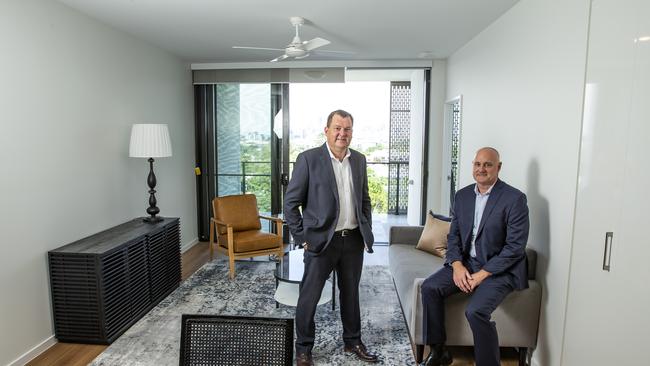 Aura Holdings directors Mark Taylor and Tim Russell inside an apartment at The Atrium in Lutwyche. Picture: Mark Cranitch.