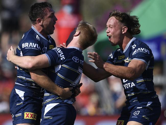 Reece Robson of the Cowboys celebrates after scoring a try during the round 24 NRL match between the St George Illawarra Dragons and the North Queensland Cowboys at Browne Park, on August 28, 2021, in Rockhampton, Australia. (Photo by Ian Hitchcock/Getty Images)