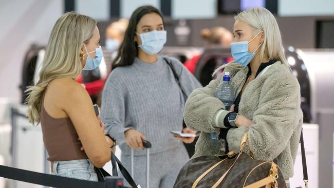 WAGs at the airport headed to the hub in Queensland. Picture: Mark Stewart