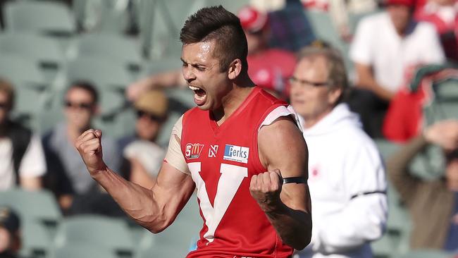 Robbie Young celebrates a goal in the third term for North. Picture Sarah Reed