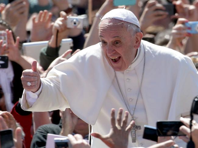Pope Francis greets the faithful as he holds Easter Mass in St. Peter's Square on April 20, 2014 in Vatican City, Vatican. Picture: Getty Images