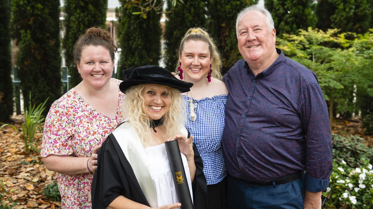 Doctor of Creative Arts graduate Terri Hethorn with family (from left) Sierra Herbert, Rhylea Millar and Joe Millar at the UniSQ graduation ceremony at Empire Theatres, Tuesday, December 13, 2022.