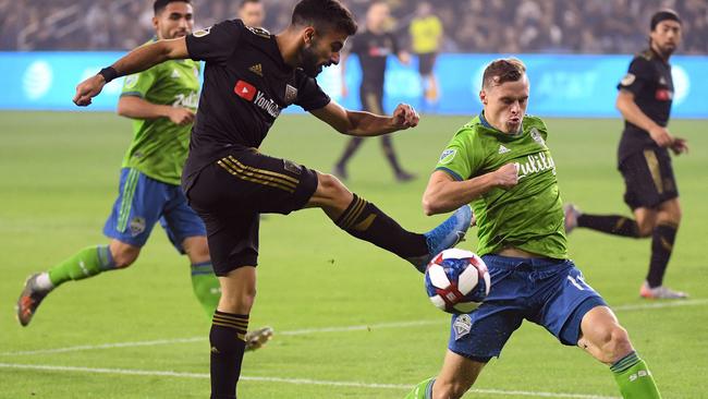 Brad Smith (right) has made a big impression in the MLS.