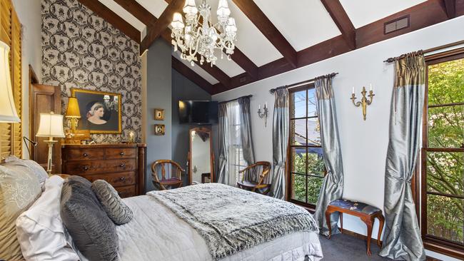 This bedroom has an old-world theme.