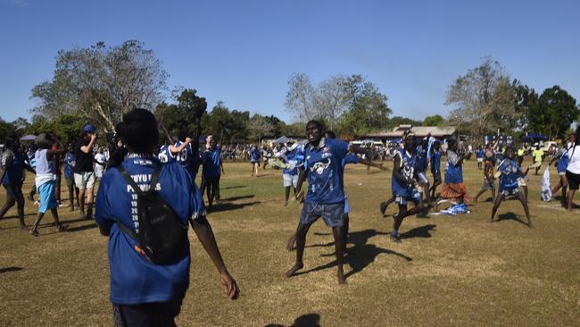 The Buffaloes celebrating in the Tiwi Island Football League grand final between Tuyu Buffaloes and Pumarali Thunder. Picture: Max Hatzoglou