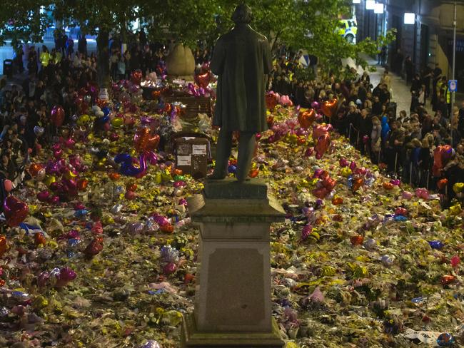 Members of the public take part in a vigil on St. Ann's Square in Manchester one week after a bomb attack at Manchester Arena killed 22 and injured dozens more. Picture: AFP