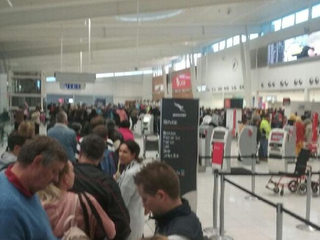 South Australian traveller Jeannine Malcolm was greeted with this line at Adelaide Airport this morning. Picture: @@Ganjm001