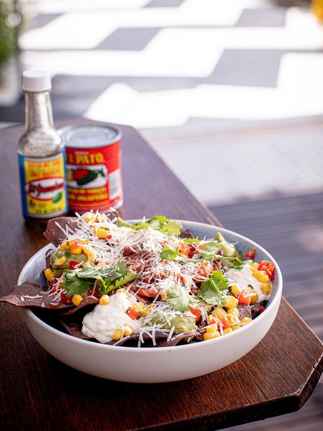 Mother Mexico’s Nacho are served on a bed of crisp blue corn tortilla chips, and topped with a spiced three-bean mix served with smooth guacamole, tangy sour cream and fresh salsa. Picture: DarkLab media