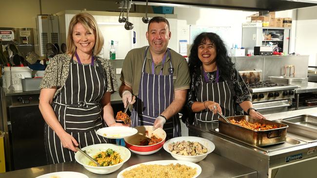 Karen, Vincent and Suzana cook up a storm at the Asylum Seeker Resource Centre. Picture: Hamish Blair