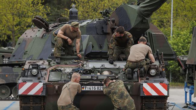 Mechanic soldiers of the Bundeswehr are seen as they service a Panzerhaubitze 2000 - the Pzh 2000 self-propelled howitzer in the Wettiner Heide international joint military exercises of NATO Response Force, on May 10, 2022 near Munster, Germany. Picture: Getty Images