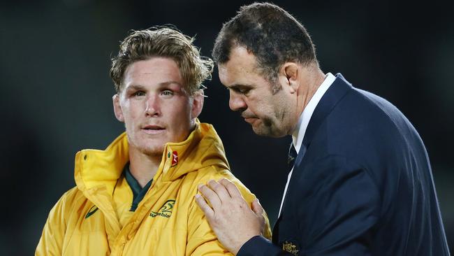 Coach Michael Cheika of the Wallabies consoles captain Michael Hooper.