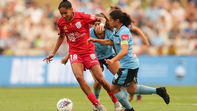 Brazilian playmaker Lais Araujo carries the ball forward for Adelaide United at Jubille Oval. Picture: Mark Metcalfe/Getty Images