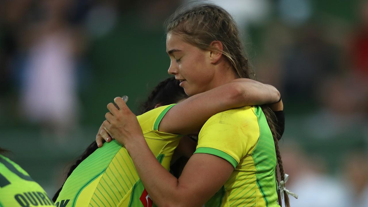 Australia's Charlotte Caslick runs away to score during their