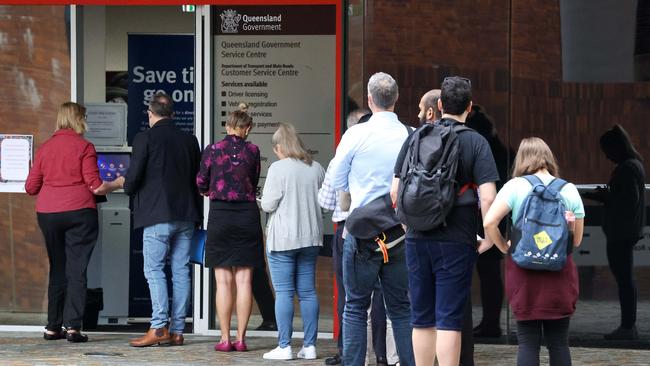 Impacted customers have been lining up to get replacement passports after the breach. Picture: Liam Kidston