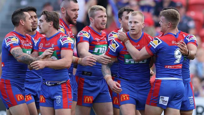 Mitch Barnett of the Knights celebrates a try. Picture: Ashley Feder/Getty Images