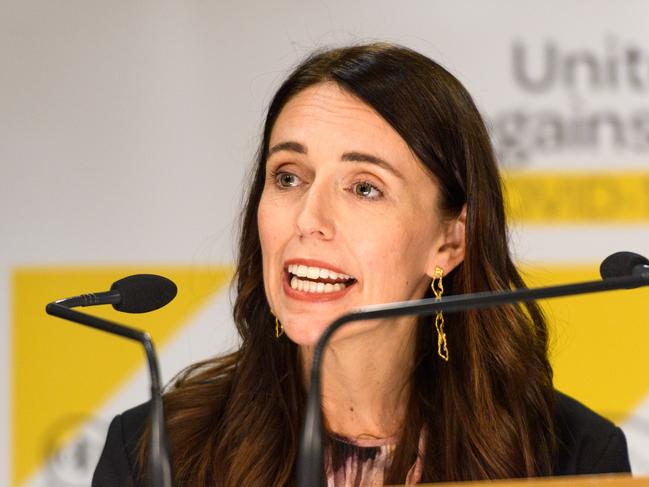 WELLINGTON, NEW ZEALAND - FEBRUARY 14: Prime Minister Jacinda Ardern speaks with media on February 14, 2021 in Wellington, New Zealand. Auckland is now at Level three with the rest of the country on level two. Three new locally acquired COVID-19 cases have been recorded in Auckland on Sunday with genomic testing underway to confirm if the cases are linked to any of the more infectious coronavirus strains.  (Photo by Mark Tantrum/Getty Images)