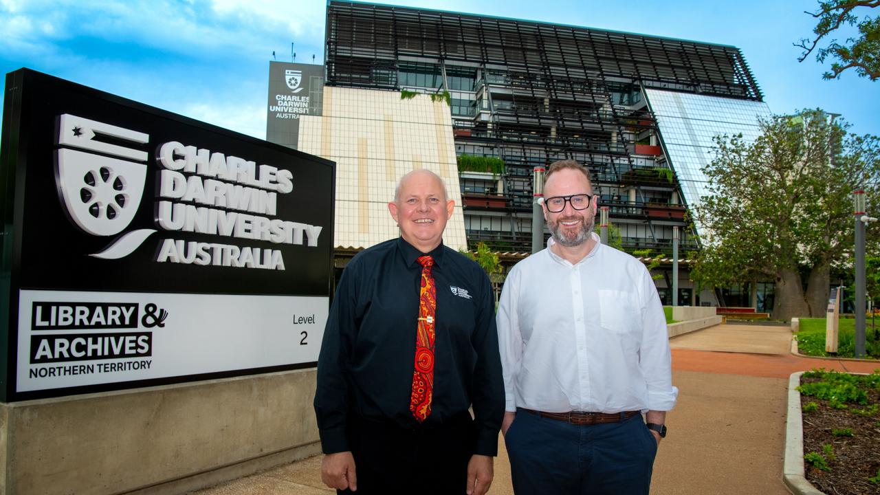 CDU Vice-Chancellor Professor Scott Bowman AO with Universities Australia CEO Luke Sheehy in front of CDU’s new Darwin City campus. Credit: CDU.