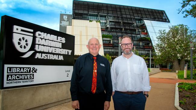 CDU Vice-Chancellor Professor Scott Bowman AO with Universities Australia CEO Luke Sheehy in front of CDU’s new Darwin City campus. Credit: CDU.