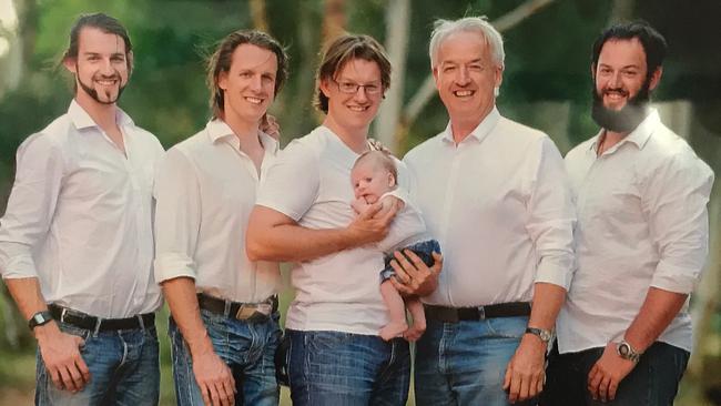 Andrew McGauchie, second from right, with his four sons and his grandson Caelan. Picture: Supplied