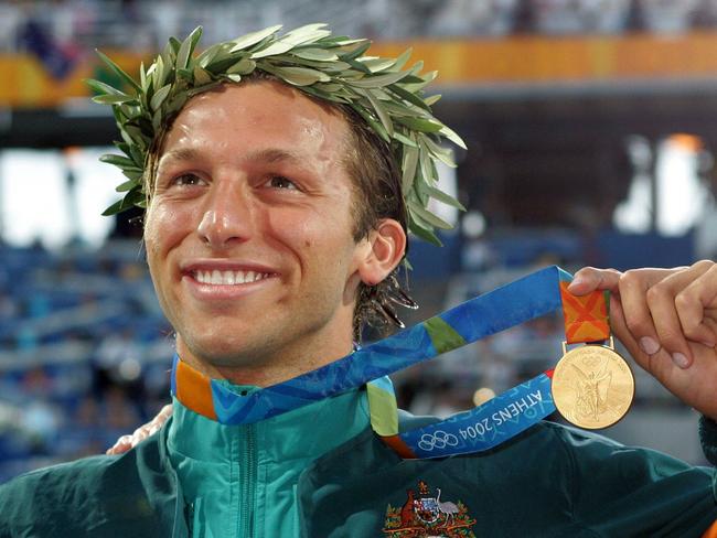 Ian Thorpe with his gold medal in 2004.