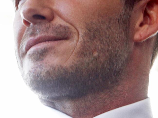 (FILES) -- A file photo taken on February 5, 2014 shows former England and Manchester United star, David Beckham during a press conference at the Perez Art Museum Miami, in Miami, Florida. Beckham was declared "sexiest man alive" by People magazine on November 17, 2015, joining an elite club including last year's winner, Chris Hemsworth, and a handful of other above-average men. AFP PHOTO / Alexia FODERE