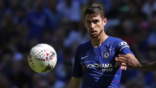 Chelsea's Italian midfielder Jorginho (L) passes the ball around Manchester City's Brazilian midfielder Fernandinho during the English FA Community Shield football match between Chelsea and Manchester City at Wembley Stadium in north London on August 5, 2018. / AFP PHOTO / Ian KINGTON / NOT FOR MARKETING OR ADVERTISING USE / RESTRICTED TO EDITORIAL USE