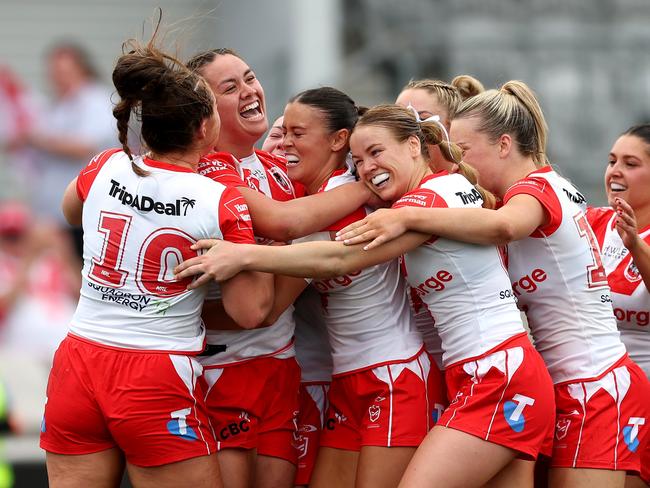 SYDNEY, AUSTRALIA - SEPTEMBER 07: The Dragon celebrate a try to Alexis Tauaneai during the round seven NRLW match between St George Illawarra Dragons and Canberra Raiders at Netstrata Jubilee Stadium on September 07, 2024 in Sydney, Australia. (Photo by Mark Metcalfe/Getty Images)