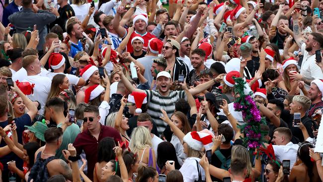 A crowd of mostly backpackers at a Christmas day beach party at Sydney’s Bronte Beach. Picture: Toby Zerna