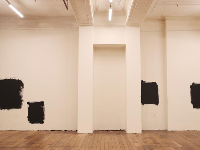 <i>Towards A Black Square</i> by Mike Parr with Dexter Rosengrave, Gotaro Uematsu, Remi Chauvin at Detached Gallery in Hobart. The artist, blind, navigated a bare gallery space with a brush and black paint. Picture: NIKKI DAVIS-JONES