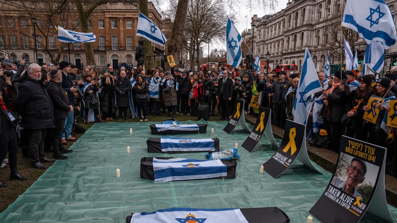 Fake coffins are laid on the ground during a memorial procession in solidarity with Israelis receiving bodies of deceased hostages from Gaza on February 20, 2025 in London, England. Picture: Carl Court/Getty Images