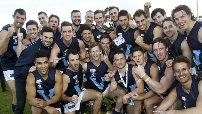 Vic Metro celebrate their win.