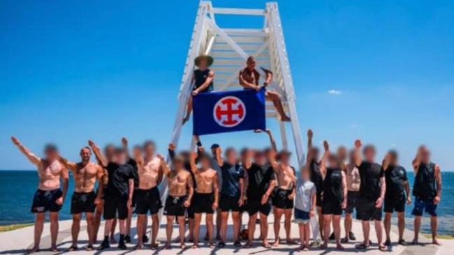 A shocking image of a group of Neo-Nazis performing a Hitler salute has been captured at Point Ormond in Elwood.