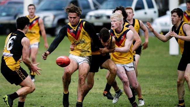 Brighton’s Jay Boyle gets a kick away against Broadview. Picture: AAP/Morgan Sette