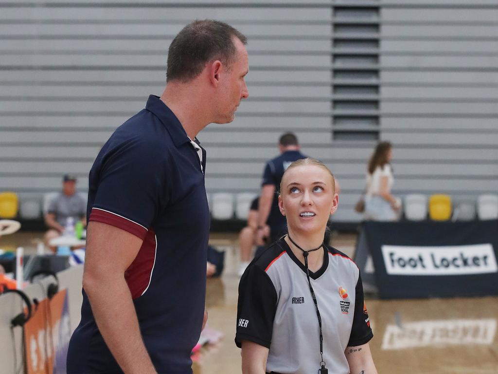 Basketball Australia Schools Championships at Carrara. Mens open final, Lake Ginninderra College Lakers V TSS (in white). TSS coach and ref have words. Picture Glenn Hampson