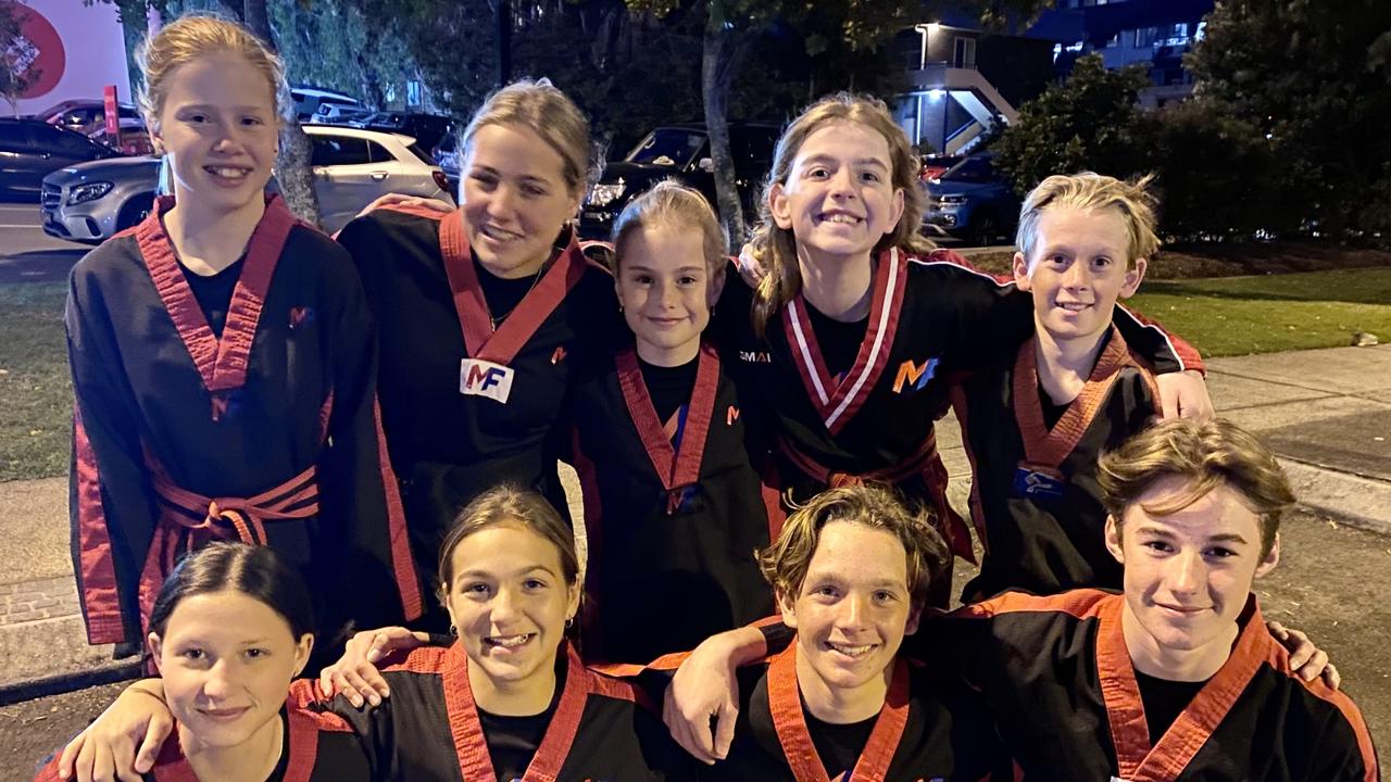 Matt Fiddes Martial Arts students Tayla Stinton, Harper Weir, Taj Salisbury, Bodhi Baker, Savannah Saville, Gwen Weir, Willow Baker, Emily Tarsilli and Kai Salisbury, are celebrating the 2032 Olympic Games.