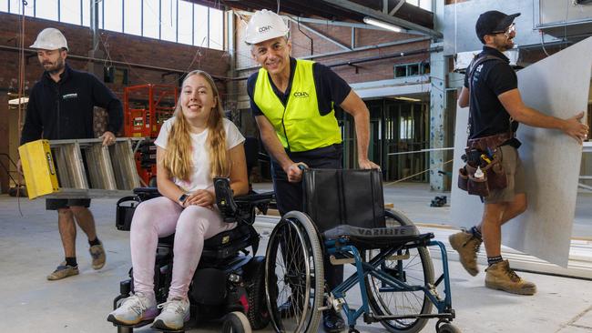 Mikaela Williams and COHA Group CEO Paul Cooley at the worksite of the new Sporting Wheelies clubhouse at Milton. Photo: Glenn Hunt