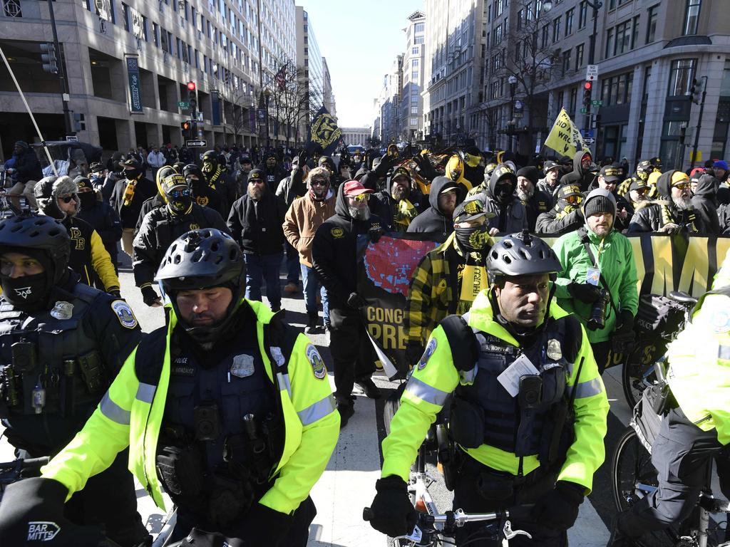 Members of the Proud Boys march in support of US President-elect Donald Trump in the street in Washington, DC, on Inauguration Day. Picture: AFP