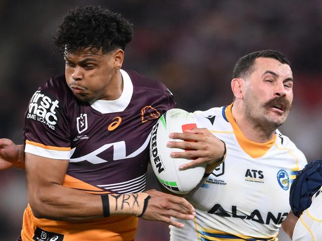 BRISBANE, AUSTRALIA - AUGUST 23: Selwyn Cobbo of the Broncos is tackled during the round 25 NRL match between Brisbane Broncos and Parramatta Eels at Suncorp Stadium, on August 23, 2024, in Brisbane, Australia. (Photo by Matt Roberts/Getty Images)