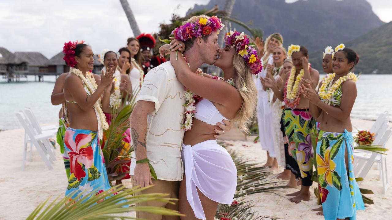 Gold Coast swimwear designer ties knot in white bikini wedding outfit