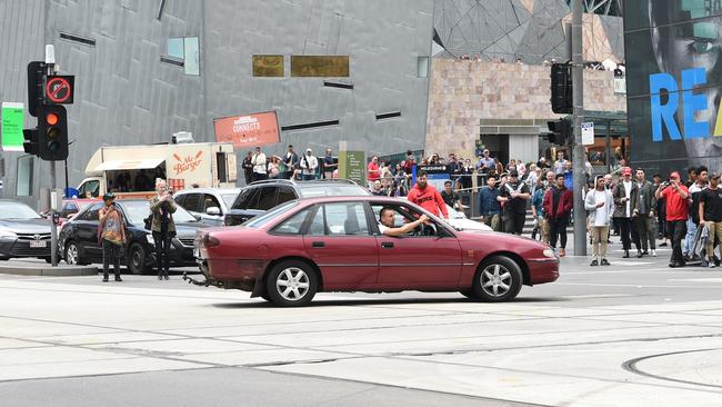 The chilling Melbourne CBD scene of crazed Bourke St killer Dimitrious Gargasoulas terrifying pedestrians in a maroon Holden Commodore on January 20, 2017 is sadly now seared into the brains of many Victorians. Gargasoulas was sentenced to a minimum of 46 years in prison for the murder of six people, killed when he mowed them down in a massacre on Bourke St.