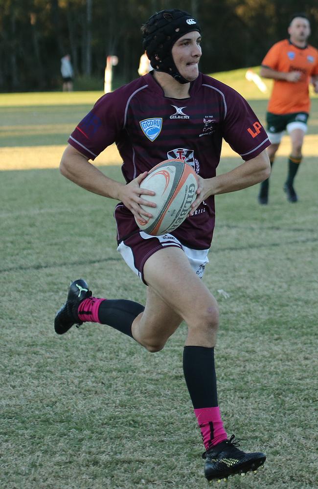 Nerang Bulls vs Surfers Paradise Dolphins Gold Coast District Rugby Union clash. Surfers Player No Nerang Player No11 Logan Watene Pic Mike Batterham