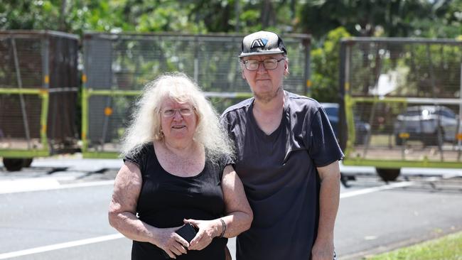 Emergency services personnel respond to a collision between a small car and a cane train at a level crossing on Beatrice Street, Mooroobool. Cathee Bass and Corey Bass heard a loud bang and rushed to the scene. Picture: Brendan Radke