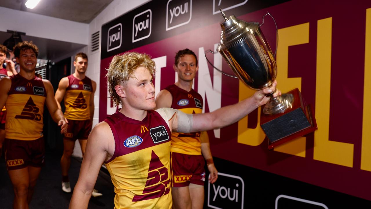 Levi Ashcroft with the spoils of victory.Picture: Russell Freeman/AFL Photos via Getty Images