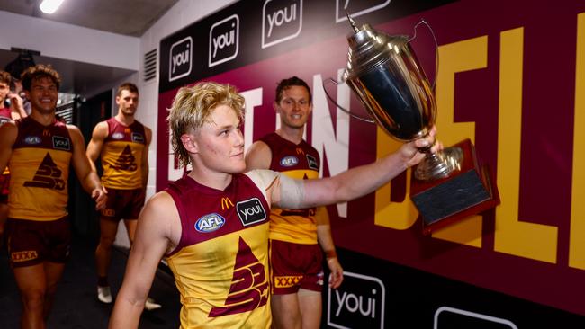 Levi Ashcroft with the spoils of victory.Picture: Russell Freeman/AFL Photos via Getty Images