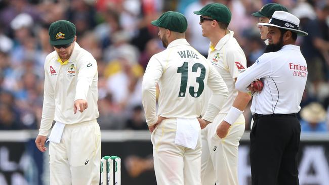 Travis Head points at the bails after James Pattinson’s unlucky brush with the off peg. Picture: Getty Images